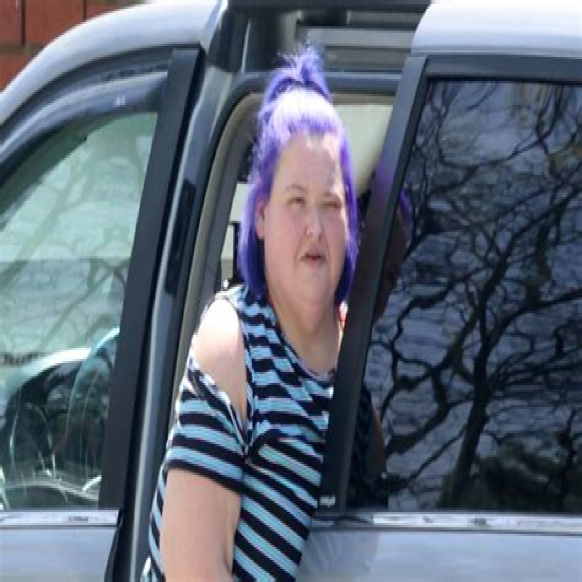 1000-Lb. Sisters' single mom Amy Slaton shows off 125-pound weight loss in new photos taken outside her Kentucky home